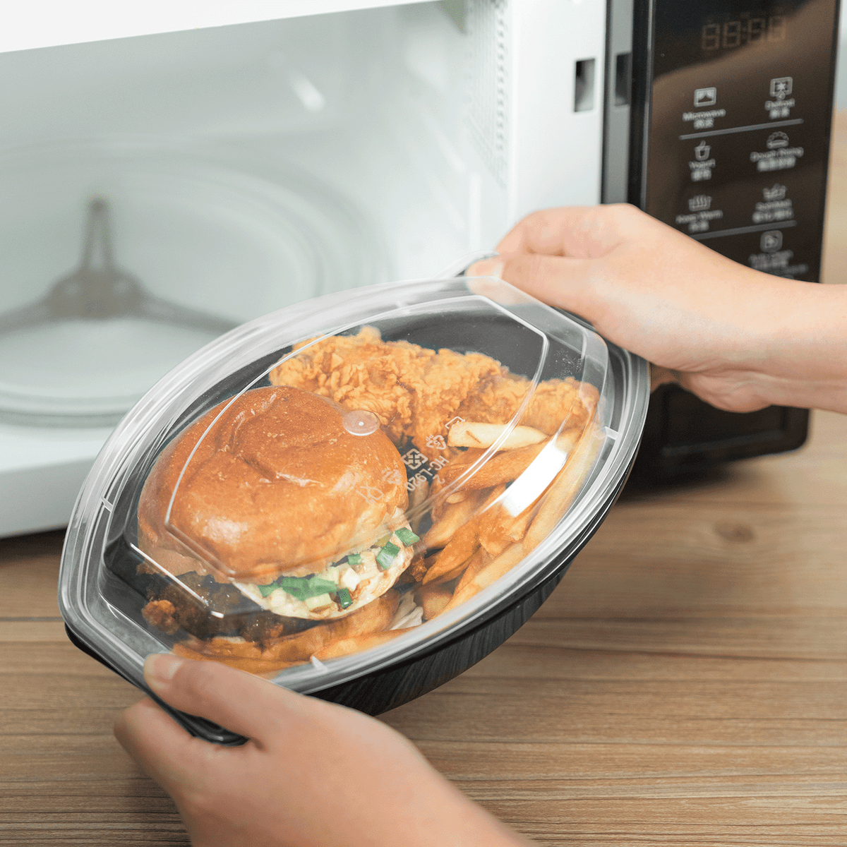 Karat 32 oz PP Microwaveable Oval Food Container with Clear Lid, Black — 150 sets — product photo 4