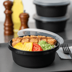 Karat 34 oz PP Tamper Resistant Injection Molded Microwaveable Black Food Container w/Clear lid — 150 sets