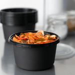 Karat 52 oz PP Tamper Resistant Injection Molded Microwaveable Black Food Container w/Clear lid — 150 sets