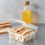 Karat 64 oz PET Tamper Resistant Hinged Deli Containers w/Flat Lid — 150 sets