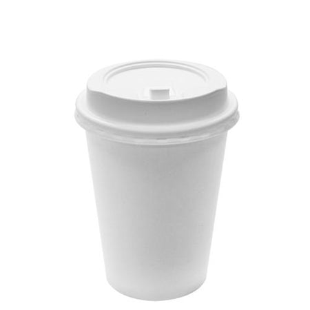 White paper coffee Cup with red lid on car roof. Paper Cup with